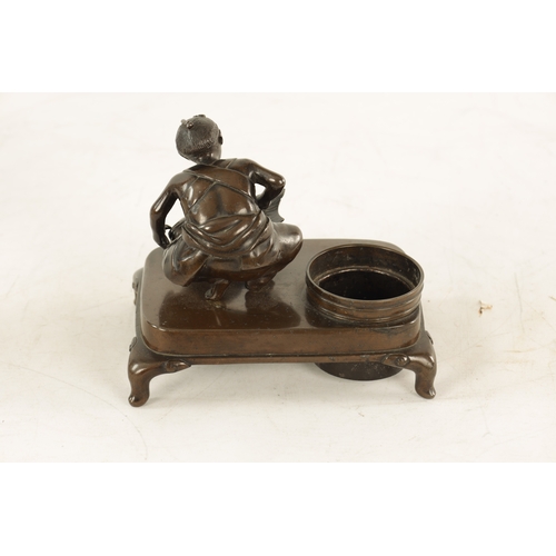 156 - A JAPANESE MEIJI PERIOD PATINATED BRONZE SCULPTURE Modelled as a fishmonger standing on a raised bas... 