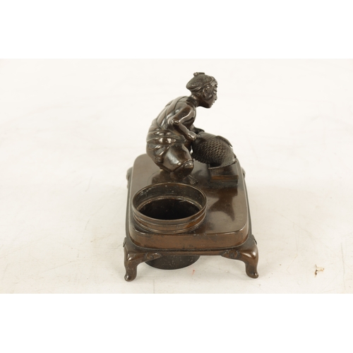 156 - A JAPANESE MEIJI PERIOD PATINATED BRONZE SCULPTURE Modelled as a fishmonger standing on a raised bas... 