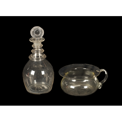 16 - AN UNUSUAL GEORGIAN GLASS SPITTOON AND BRANDY DECANTER the spittoon with a broad rim, rounded body a... 