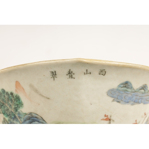 168 - A 19TH CENTURY CHINESE PORCELAIN DISH ON HARDWOOD STAND decorated with landscape views of a palace b... 