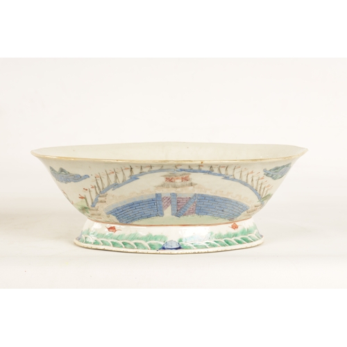 168 - A 19TH CENTURY CHINESE PORCELAIN DISH ON HARDWOOD STAND decorated with landscape views of a palace b... 