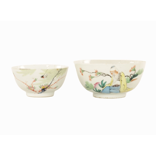 175 - TWO MATCHING EARLY 20TH CENTURY CHINESE CANTON BOWLS with brightly coloured figure and bird landscap... 