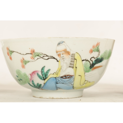 175 - TWO MATCHING EARLY 20TH CENTURY CHINESE CANTON BOWLS with brightly coloured figure and bird landscap... 