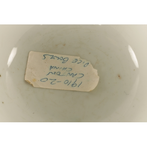 175 - TWO MATCHING EARLY 20TH CENTURY CHINESE CANTON BOWLS with brightly coloured figure and bird landscap... 
