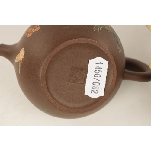 260 - TWO 19TH CENTURY CHINESE TERRACOTTA SMALL TEAPOTS the blue example with branch work handles and spou... 