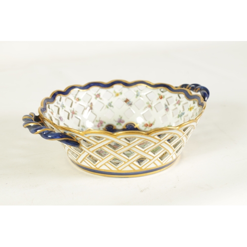 30 - A 19TH CENTURY FIRST PERIOD WORCESTER TYPE TWO-HANDLED LATTICEWORK BASKET decorated in blue and gilt... 