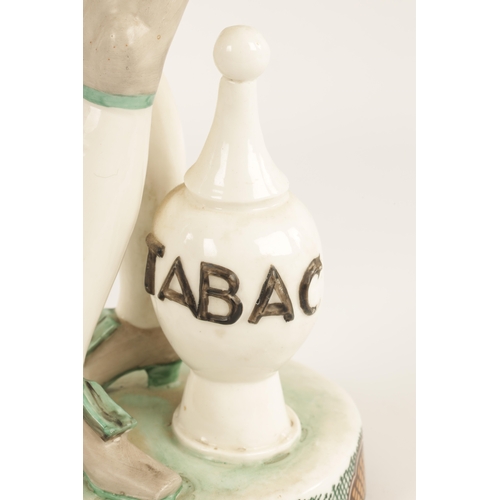 36 - A PAIR OF JOSEPH WACKERLE GERMAN AESTHETIC FIGURAL SCULPTURES depicting one labelled 'tabac' and the... 