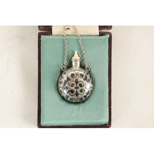 367 - A 19TH CENTURY RUSSIAN NIELLO SILVER SCENT BOTTLE with foliage decoration - in fitted leather case (... 