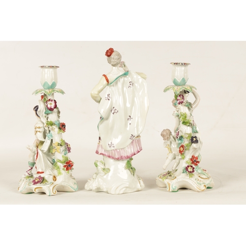 38 - A PAIR OF 19TH CENTURY DERBY TYPE PORCELAIN CANDLESTICKS modelled as a gallant and lady with cherub ... 