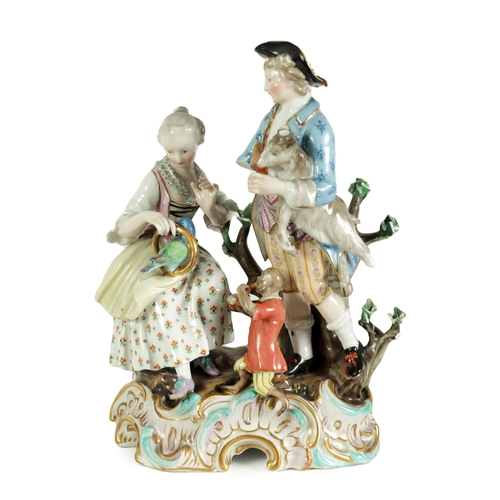 41 - A LATE 19TH CENTURY MEISSEN FIGURE GROUP depicting a seated lady and gentleman with a parrot and goa... 
