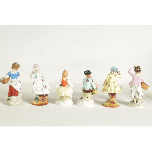 43 - A PAIR OF LATE 19TH CENTURY SITZENDORF PORCELAIN SEATED FIGURES depicting flower sellers dressed in ... 