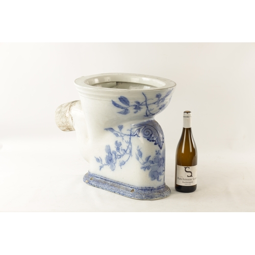 46 - A VICTORIAN BLUE AND WHITE PORCELAIN SANITAS 'WASH DOWN CLOSET' TOILET decorated with floral branchw... 