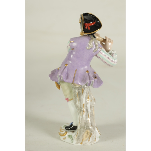 49 - A LATE 19TH CENTURY MEISSEN FIGURE OF A FLAUTIST depicted as a standing young man on a gilt-edged st... 