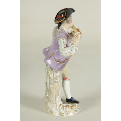 49 - A LATE 19TH CENTURY MEISSEN FIGURE OF A FLAUTIST depicted as a standing young man on a gilt-edged st... 