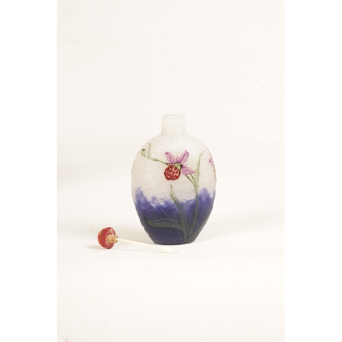 5 - A DAUM NANCY ETCHED AND ENAMELLED SPIDER WEB AND ORCHID SNUFF BOTTLE With purple and white mottled g... 