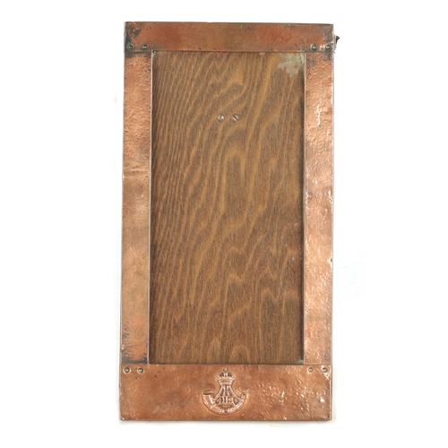 543 - AN ARTS AND CRAFTS COPPER FRAMED PICTURE FRAME IN THE LIBERTYS STYLE bearing military motif. (36.5cm... 