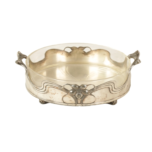 546 - A STYLISH ART NOUVEAU WMF LIBERTY'S-STYLE POLISHED PEWTER AND GLASS LINED DISH the glass dish with l... 