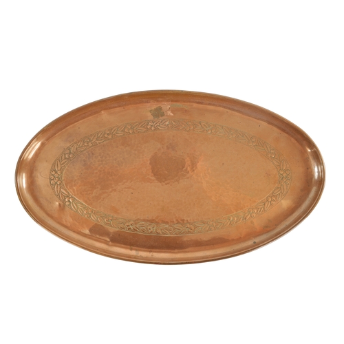 550 - AN ARTS AND CRAFTS OVAL PLENISHED COPPER TRAY with leaf and berry engraved inner border. (51cm wide ... 