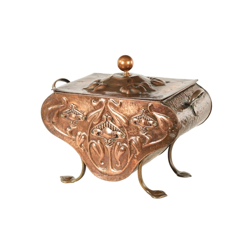 556 - AN ART NOUVEAU PLANISHED COPPER COAL BOX with lift-off lid and shaped body embossed with stylised fl... 