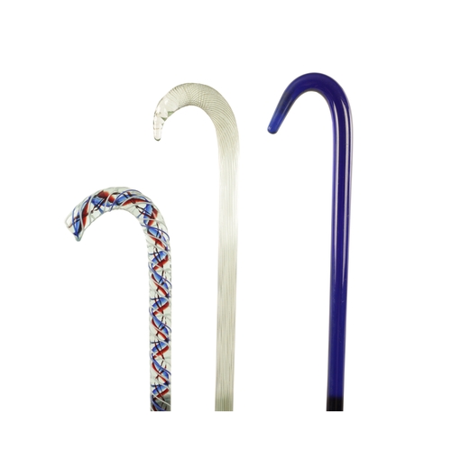 562 - THREE LATE 19TH CENTURY FRIGGER WALKING STICKS comprising of a blue air twist, a Bristol blue and a ... 
