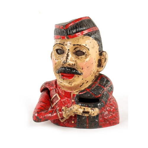 577 - AN EARLY 20TH CENTURY PAINTED CAST IRON MECHANICAL 
