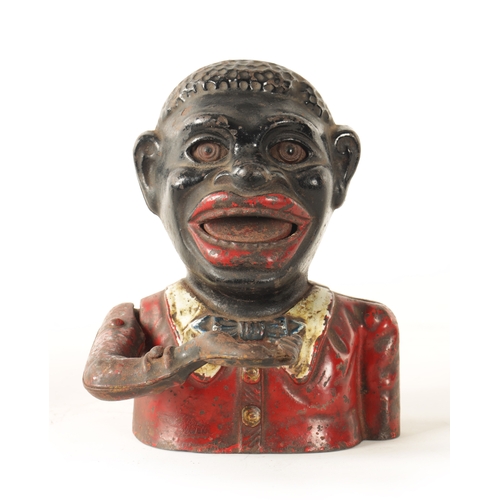 579 - A LATE 19TH CENTURY PAINTED CAST IRON 'JOLLY' MECHANICAL MONEY BANK (16cm high)