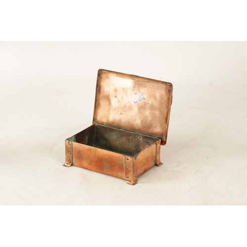 542 - AN ART NOUVEAU A.E.JONES COPPER AND ENAMEL LIDDED BOX having strap rivet work design and centred by ... 