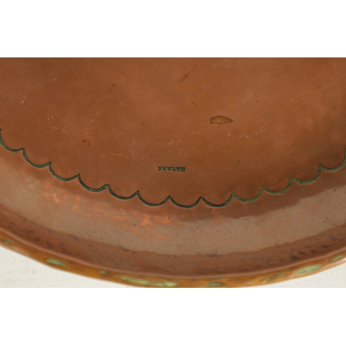 544 - AN ARTS AND CRAFTS COPPER NEWLYN SCHOOL WALL PLAQUE of dished form with planished design, embossed f... 