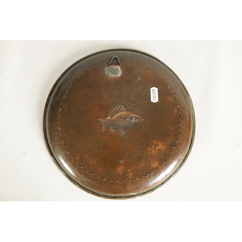 544 - AN ARTS AND CRAFTS COPPER NEWLYN SCHOOL WALL PLAQUE of dished form with planished design, embossed f... 