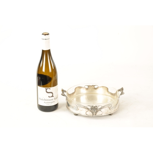 546 - A STYLISH ART NOUVEAU WMF LIBERTY'S-STYLE POLISHED PEWTER AND GLASS LINED DISH the glass dish with l... 