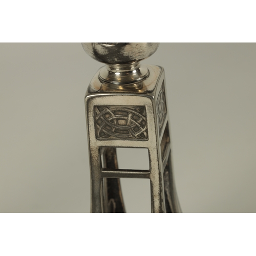 548 - A PAIR OF EARLY 20TH CENTURY WMF SECESSIONIST SILVER PLATED CANDLESTICKS of flared tapering form wit... 