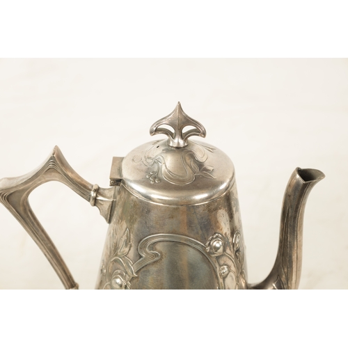 554 - A STYLISH ART NOUVEAU WMF LIBERTY'S-STYLE POLISHED PEWTER COFFEE POT with stylised floral designs to... 