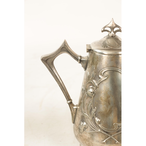 554 - A STYLISH ART NOUVEAU WMF LIBERTY'S-STYLE POLISHED PEWTER COFFEE POT with stylised floral designs to... 