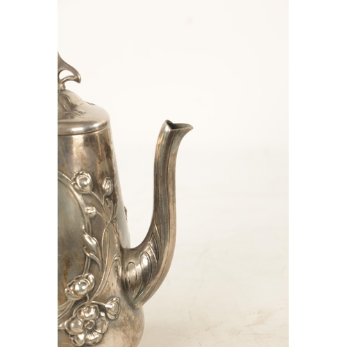 554 - A STYLISH ART NOUVEAU WMF LIBERTY'S-STYLE POLISHED PEWTER COFFEE POT with stylised floral designs to... 