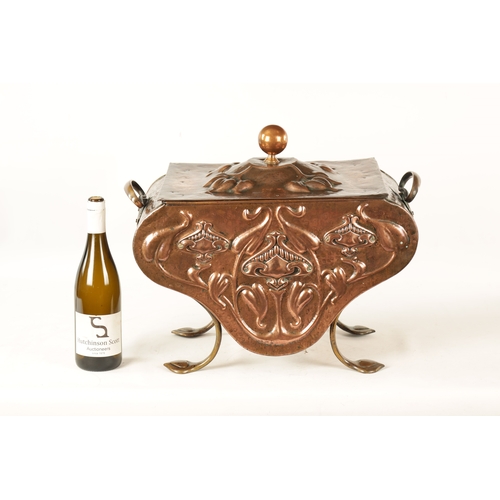 556 - AN ART NOUVEAU PLANISHED COPPER COAL BOX with lift-off lid and shaped body embossed with stylised fl... 