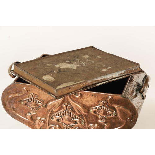 556 - AN ART NOUVEAU PLANISHED COPPER COAL BOX with lift-off lid and shaped body embossed with stylised fl... 