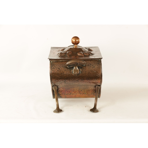 556 - AN ART NOUVEAU PLANISHED COPPER COAL BOX with lift-off lid and shaped body embossed with stylised fl... 