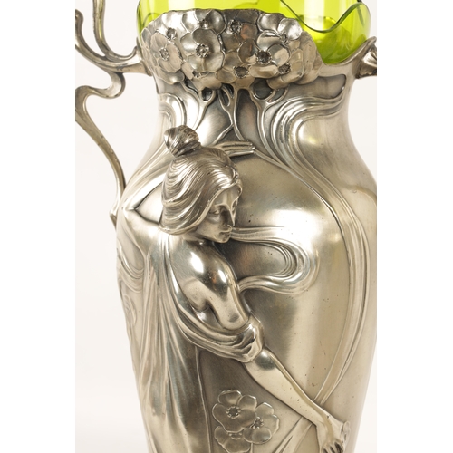 557 - A STYLISH LARGE PAIR OF ART NOUVEAU WMF PEWTER VASES WITH GREEN GLASS LINERS the petal shaped bases ... 