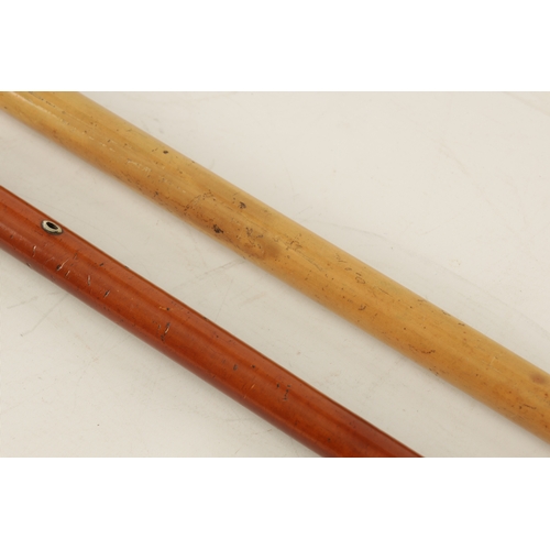 561 - TWO LATE 19TH CENTURY SILVER MOUNTED WALKING STICKS with malacca canes. (92cm and 80cm long)