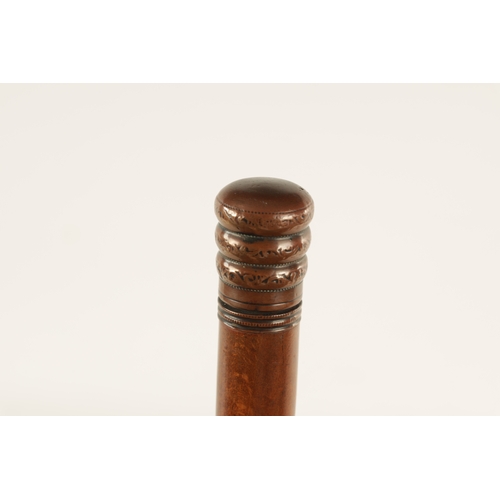 564 - A LATE 19TH CENTURY DECANTER WALKING STICK WITH SCREW OFF HANDLE with copper mounts revealing a elon... 