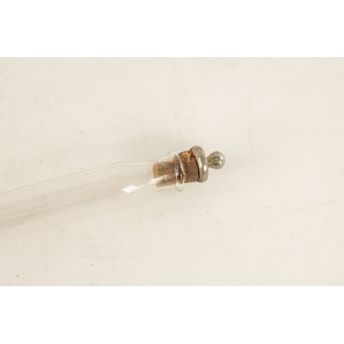 564 - A LATE 19TH CENTURY DECANTER WALKING STICK WITH SCREW OFF HANDLE with copper mounts revealing a elon... 