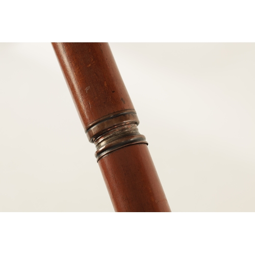 564 - A LATE 19TH CENTURY DECANTER WALKING STICK WITH SCREW OFF HANDLE with copper mounts revealing a elon... 