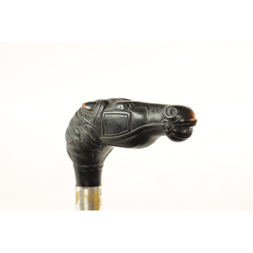567 - A 19TH CENTURY EBONISED WALKING CANE AND ANOTHER ELEPHANT'S HEAD WALKING STICK the ebonised cane wit... 