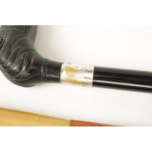 567 - A 19TH CENTURY EBONISED WALKING CANE AND ANOTHER ELEPHANT'S HEAD WALKING STICK the ebonised cane wit... 