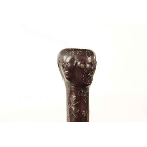 570 - A GOOD MID-19TH CENTURY FOLK ART MARRIAGE WALKING STICK inlaid with brass stud work and mother-of-pe... 