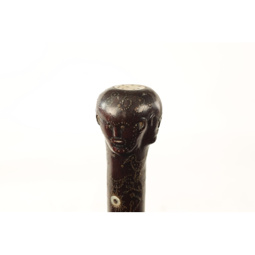 570 - A GOOD MID-19TH CENTURY FOLK ART MARRIAGE WALKING STICK inlaid with brass stud work and mother-of-pe... 
