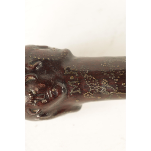570 - A GOOD MID-19TH CENTURY FOLK ART MARRIAGE WALKING STICK inlaid with brass stud work and mother-of-pe... 