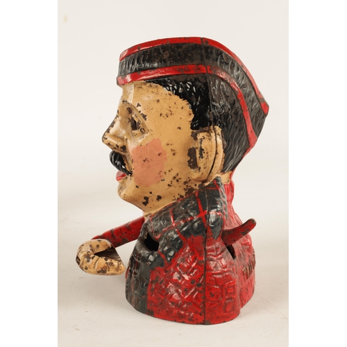 577 - AN EARLY 20TH CENTURY PAINTED CAST IRON MECHANICAL 