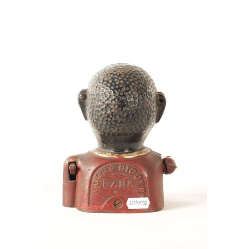 579 - A LATE 19TH CENTURY PAINTED CAST IRON 'JOLLY' MECHANICAL MONEY BANK (16cm high)