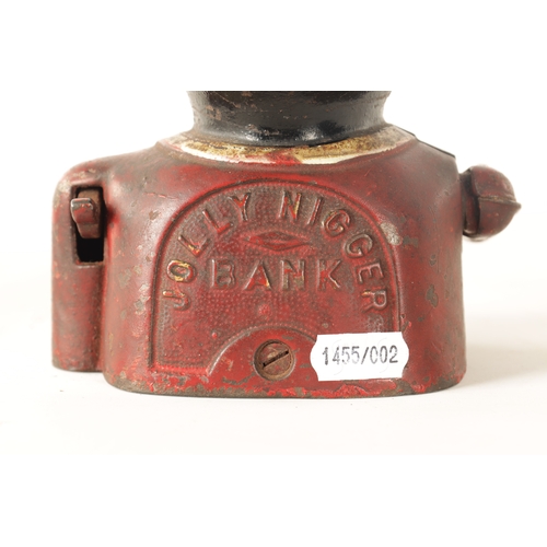 579 - A LATE 19TH CENTURY PAINTED CAST IRON 'JOLLY' MECHANICAL MONEY BANK (16cm high)